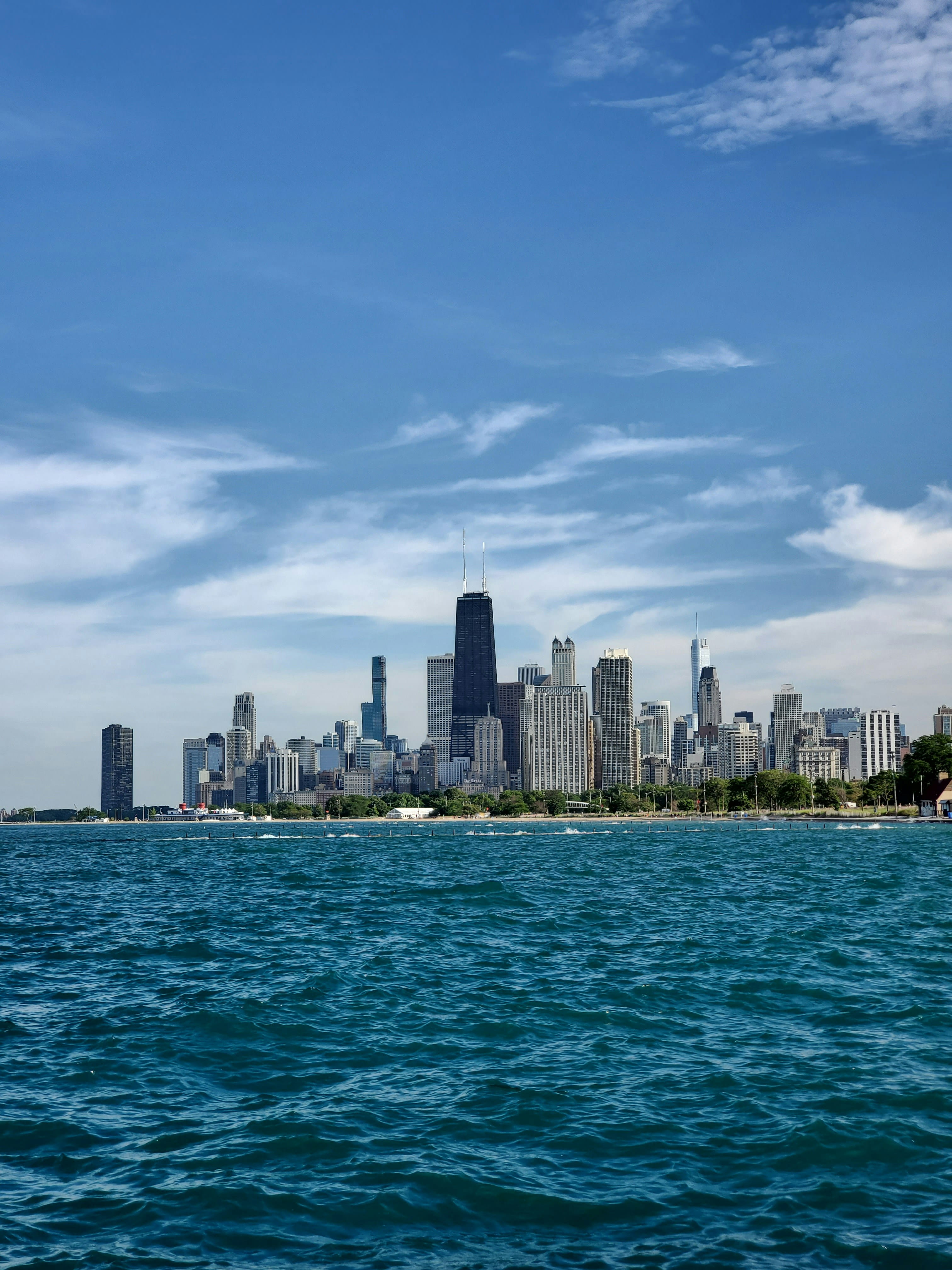 Chicago skyline and the Chicago River framed by downtown high-rises at dusk